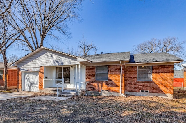 single story home featuring a garage and covered porch