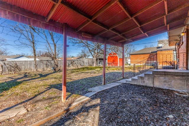 view of yard with a storage shed