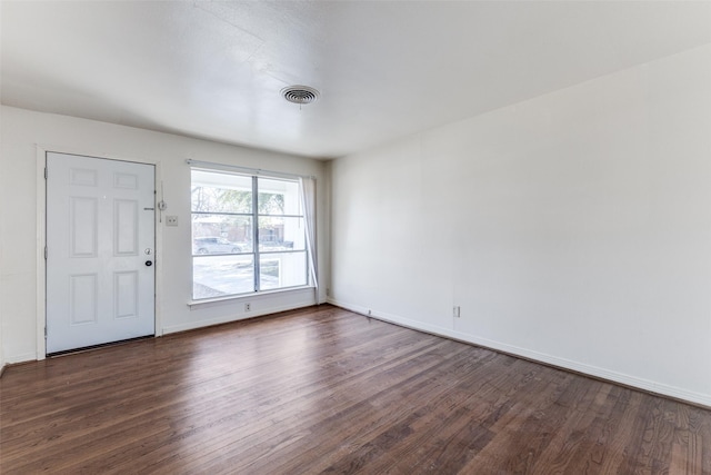 interior space with dark hardwood / wood-style flooring