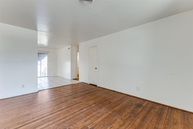 unfurnished room featuring light hardwood / wood-style flooring