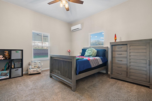 bedroom featuring carpet floors, a wall mounted air conditioner, and ceiling fan