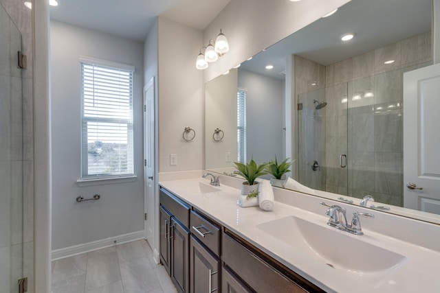 bathroom with vanity and an enclosed shower