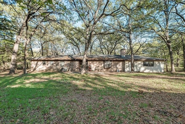 view of front of home with a front yard