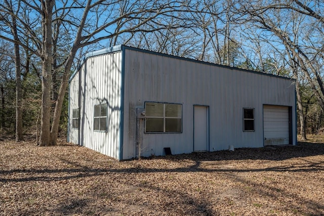 view of outbuilding with a garage