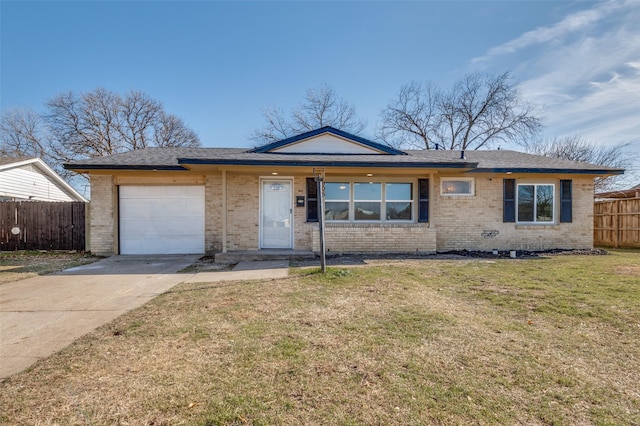 ranch-style house featuring a garage and a front lawn