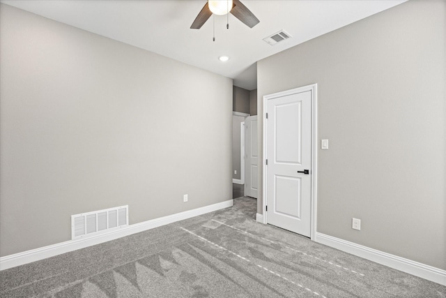 unfurnished bedroom featuring ceiling fan and carpet flooring