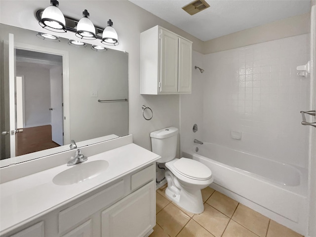 full bathroom featuring tile patterned flooring, vanity, washtub / shower combination, and toilet