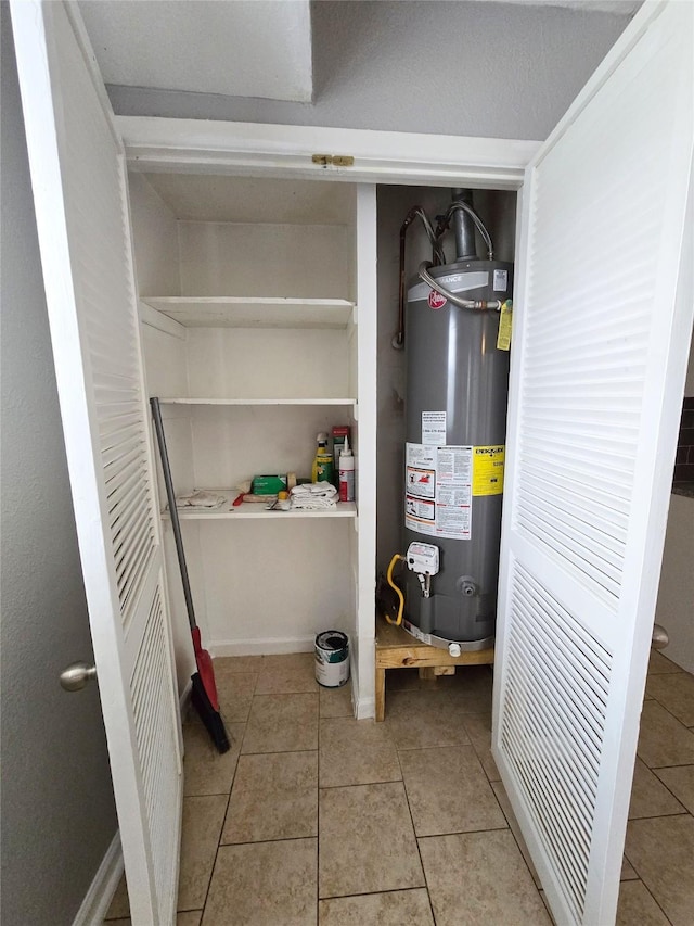 utility room with water heater