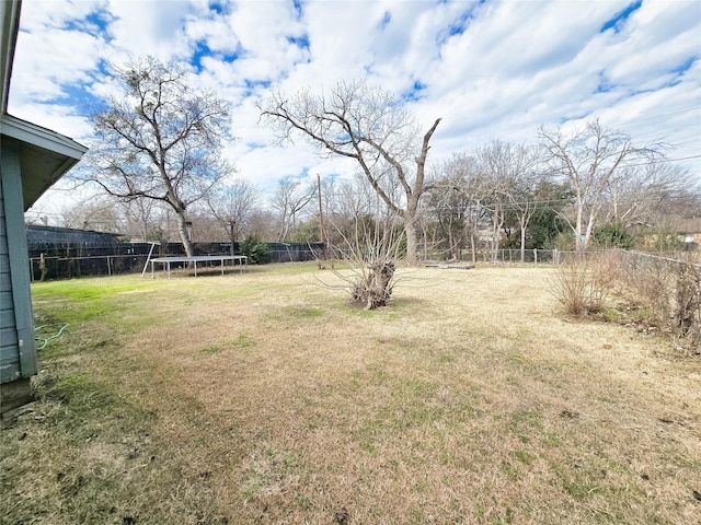 view of yard featuring a trampoline