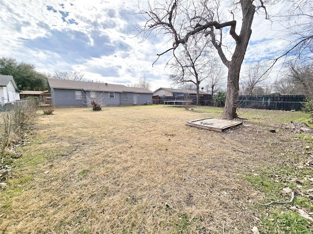 view of yard featuring a trampoline