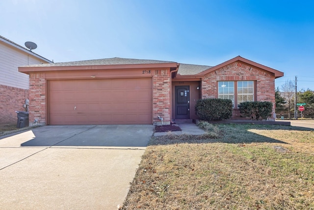 ranch-style home with a garage and a front yard