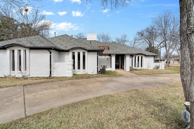 view of front of home with a front yard