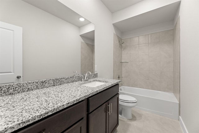 full bath with shower / tub combination, tile patterned flooring, vanity, and toilet