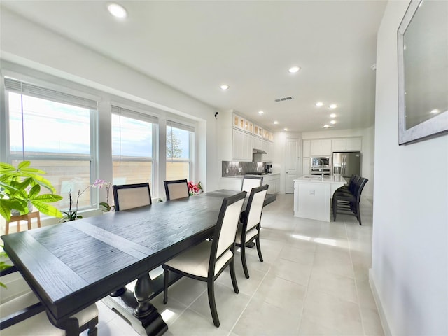 view of tiled dining space