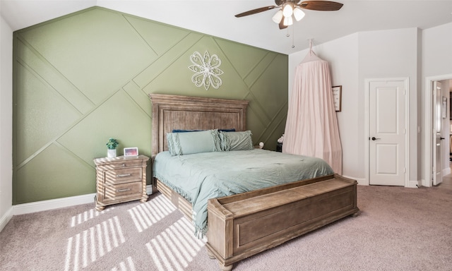 bedroom featuring vaulted ceiling, carpet floors, ceiling fan, and baseboards