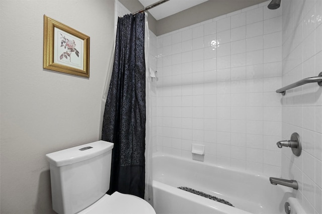 bathroom with shower / bathtub combination with curtain and toilet