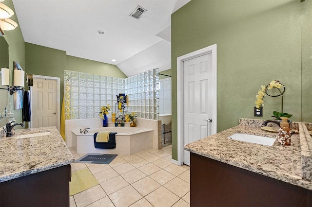 bathroom featuring vanity, tile patterned floors, plus walk in shower, and lofted ceiling