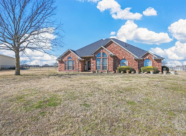 view of front of home with a front yard