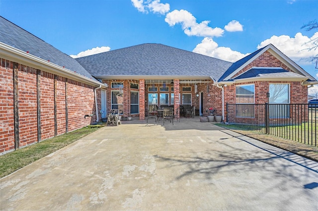 back of house featuring a patio