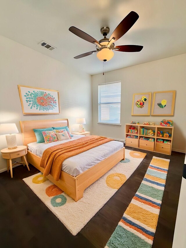 bedroom featuring ceiling fan and dark hardwood / wood-style floors