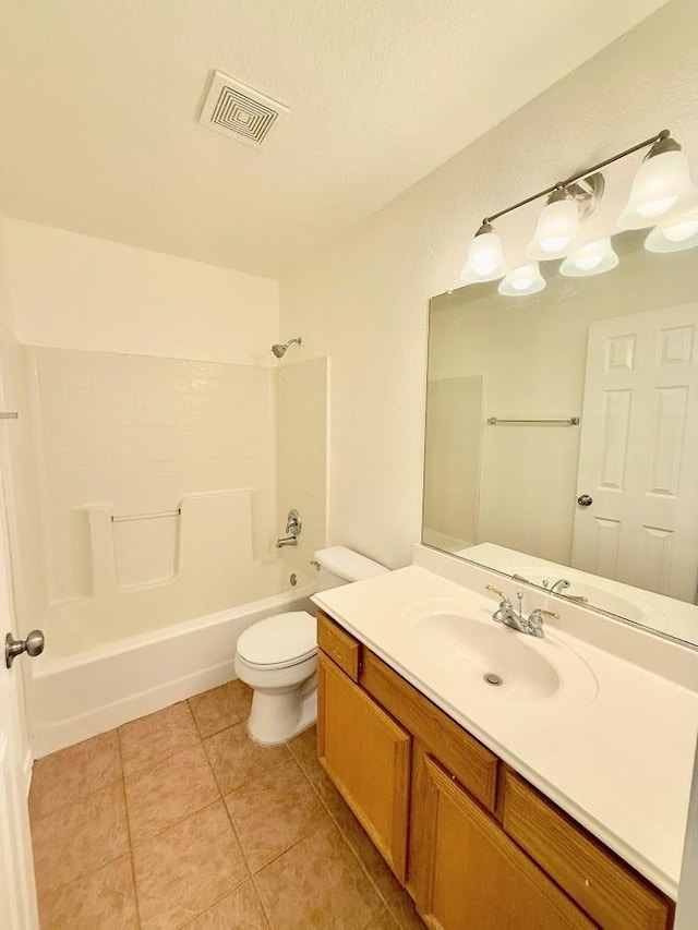 full bathroom with vanity, toilet, tile patterned flooring, and shower / bathing tub combination