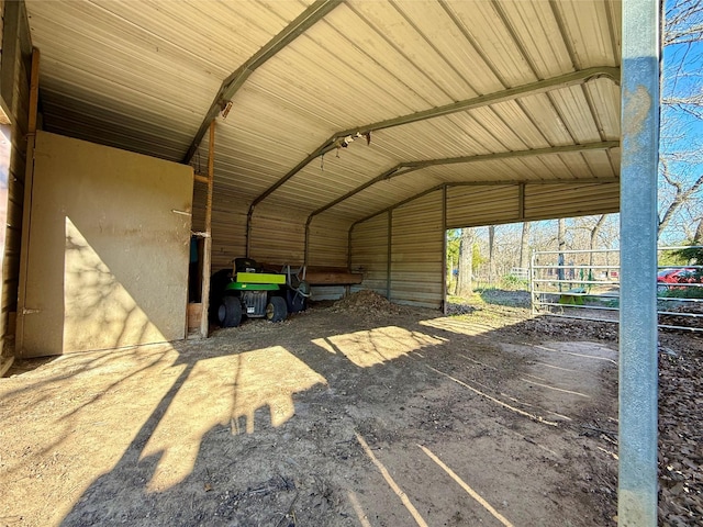 view of vehicle parking with a detached carport