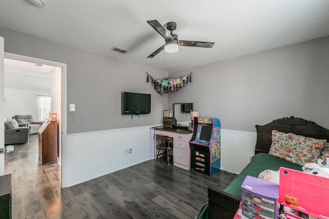 office space with dark wood-type flooring and ceiling fan