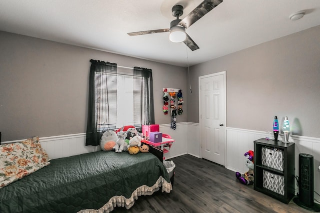 bedroom featuring dark wood-type flooring and ceiling fan