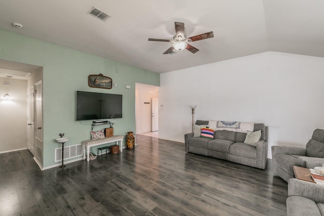 living room featuring ceiling fan, dark hardwood / wood-style floors, and vaulted ceiling