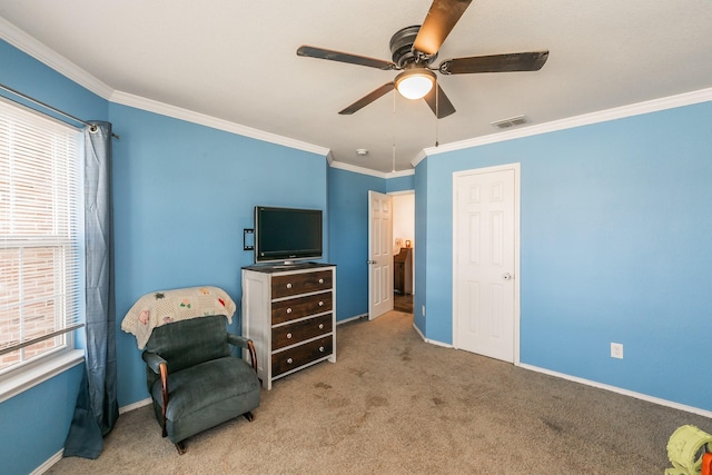 living area featuring ornamental molding, light carpet, and ceiling fan