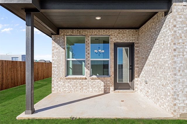 doorway to property featuring a patio