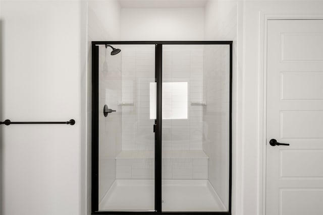 bathroom featuring walk in shower