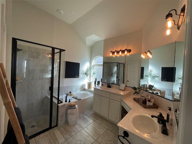 bathroom featuring lofted ceiling, plus walk in shower, and vanity