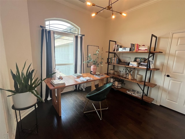 office space with ornamental molding, wood finished floors, and a chandelier