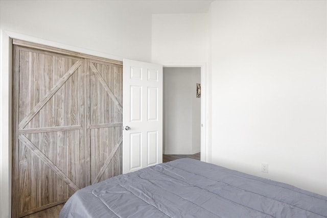 bedroom featuring hardwood / wood-style flooring