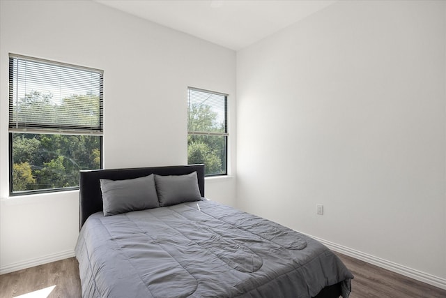 bedroom featuring hardwood / wood-style flooring