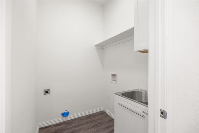 clothes washing area with sink, cabinets, washer hookup, dark wood-type flooring, and hookup for an electric dryer