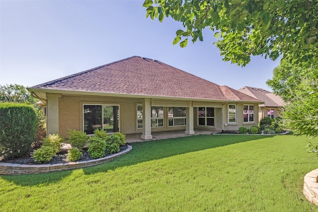 9704 Freeport Dr, Denton, TX 76207 - rear view of property with stucco siding, a yard, a shingled roof, and a patio