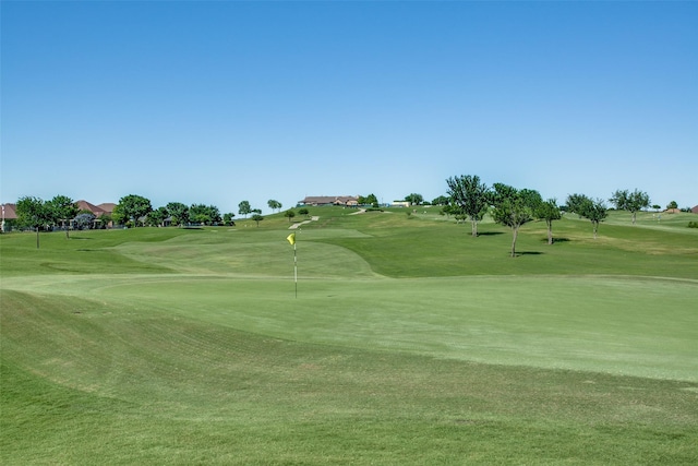 9704 Freeport Dr, Denton, TX 76207 - view of community with golf course view and a yard