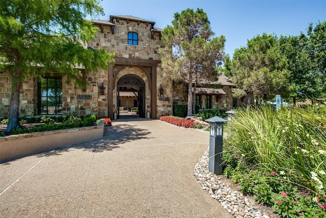 9704 Freeport Dr, Denton, TX 76207 - property entrance with stone siding