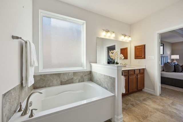 bathroom with vanity and a bathing tub