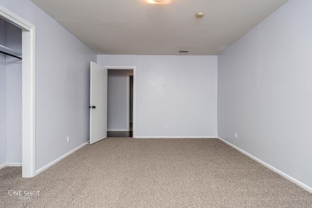 unfurnished bedroom with carpet floors