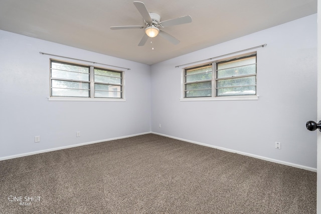 empty room with plenty of natural light, carpet floors, and ceiling fan