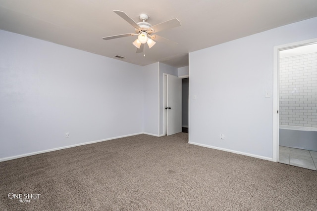 unfurnished room with carpet flooring and ceiling fan