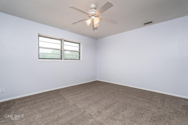 unfurnished room with ceiling fan and carpet flooring