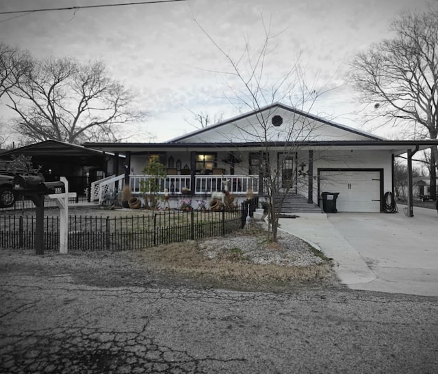 view of front of home with a garage and covered porch