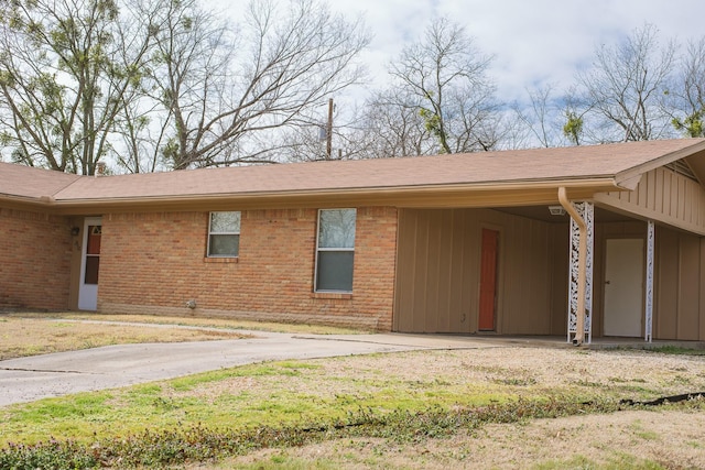 exterior space with a carport