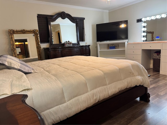 bedroom with ornamental molding and wood-type flooring