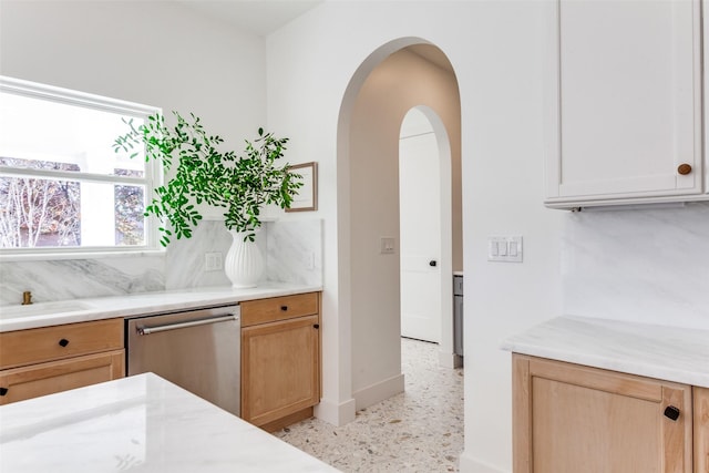 kitchen with stainless steel dishwasher and sink