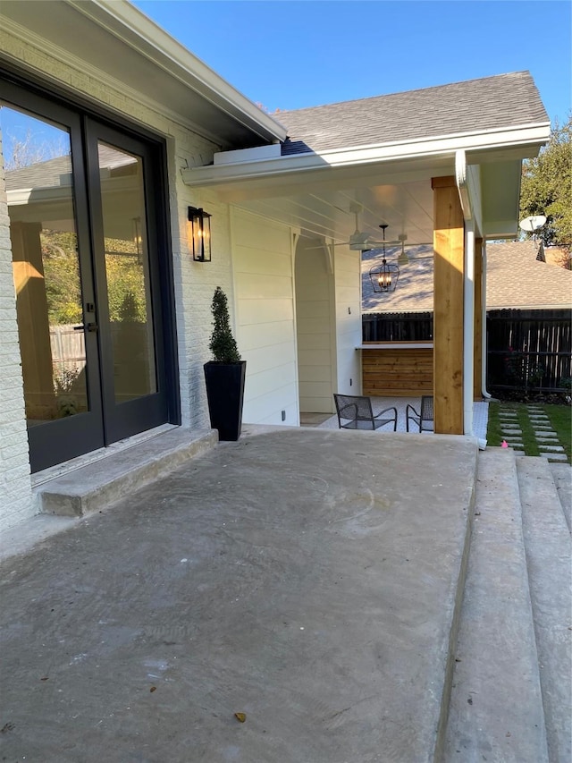 entrance to property featuring a patio area and french doors